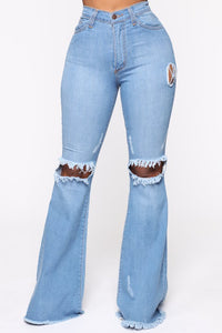 Knee Rip Flare Jean In Medium Blue