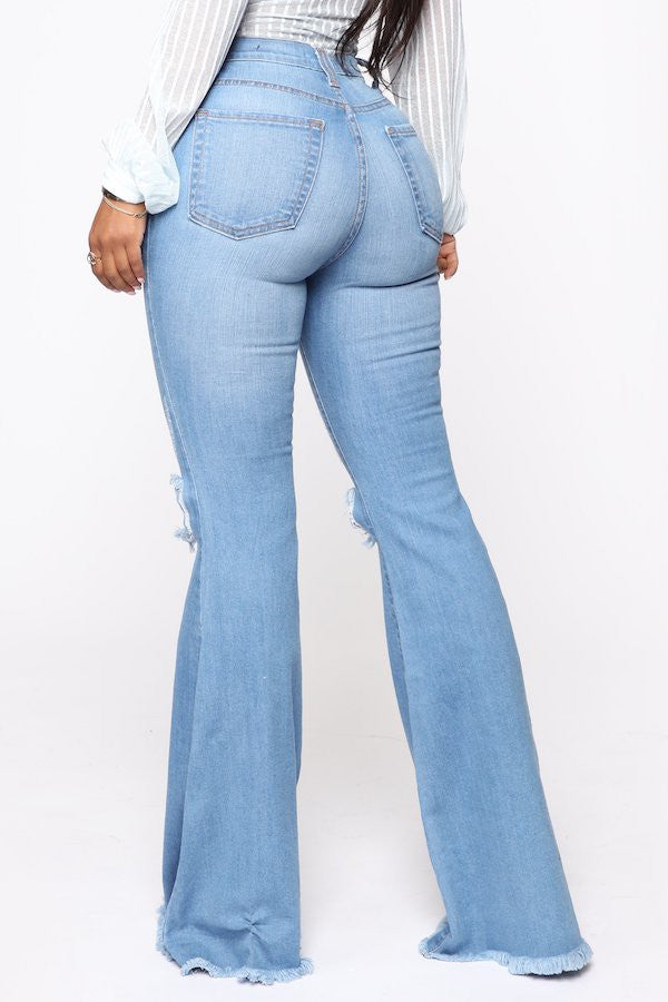 Knee Rip Flare Jean In Medium Blue